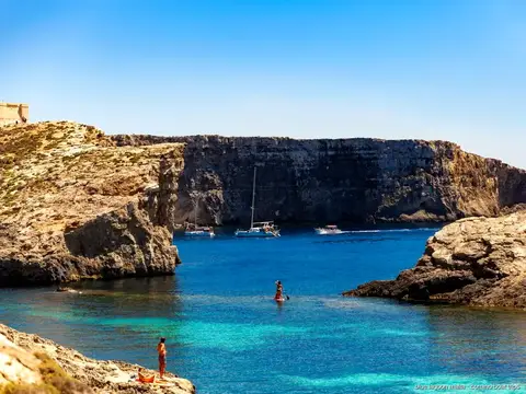 Blue Lagoon swim stop seen from the deck of the Bugibba cruise