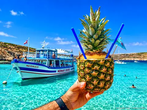 Traditional Maltese schooner sailing towards Comino island
