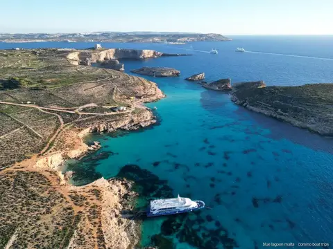 Cruise boat leaving Sliema harbour for the Blue Lagoon